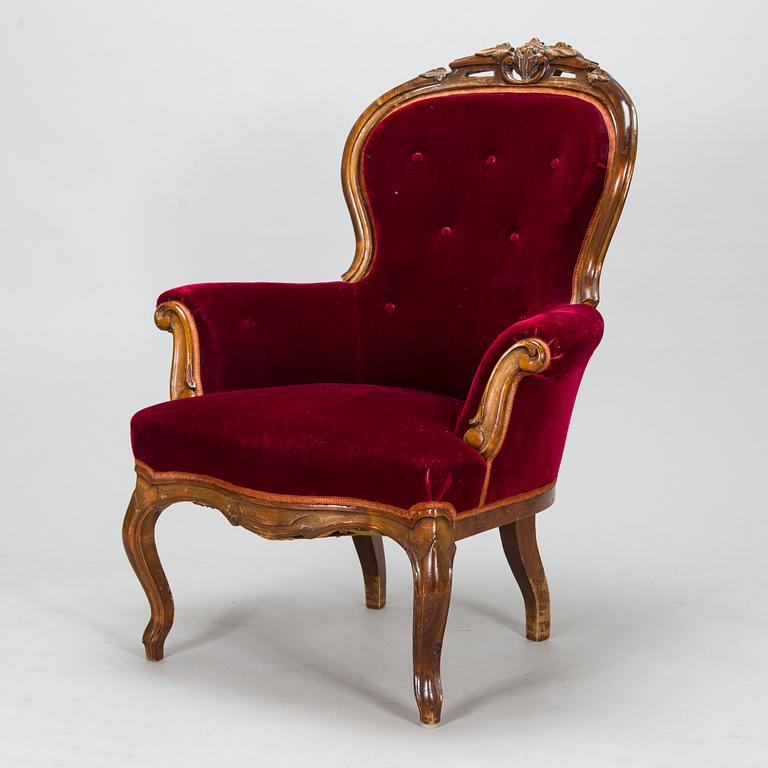 A Rococo Revival style armchair, late 19th century.