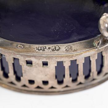 Two silver salt cellars, and a mustard pot, French hallmarks, late 18th Century.