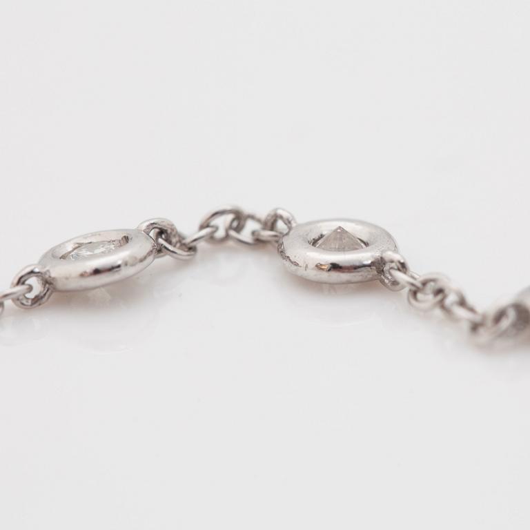 A btilliant cut diamond necklace. Total carat weight circa 4.95 cts. Quality circa H/SI.