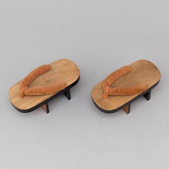 A pair of Japanese 'Geta' shows and two Chinese pouches, early 20th century.