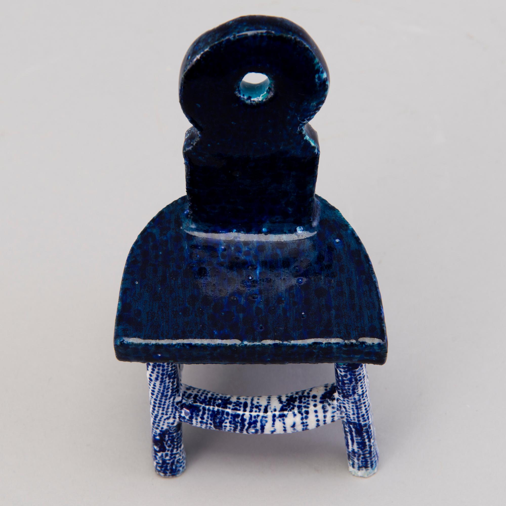 HEINI RIITAHUHTA, a porcelain miniature sculpture 'Chair' signed Heini Riitahuhta.