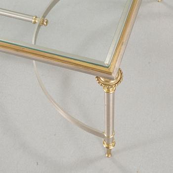 A glass and metal table, possibly Nordiska Kompaniet. 20th century.