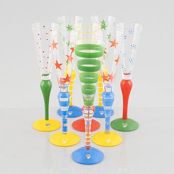 Anne Nilsson, a set of 8 champagne glasses,  "Clown" Orrefors, Sweden.