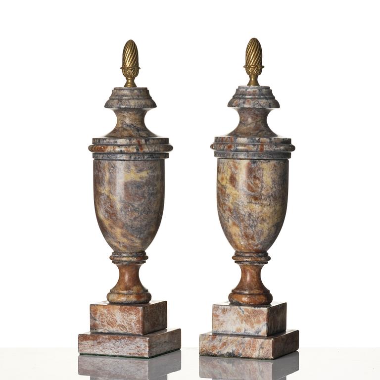 A pair of marble urns, around year 1900.