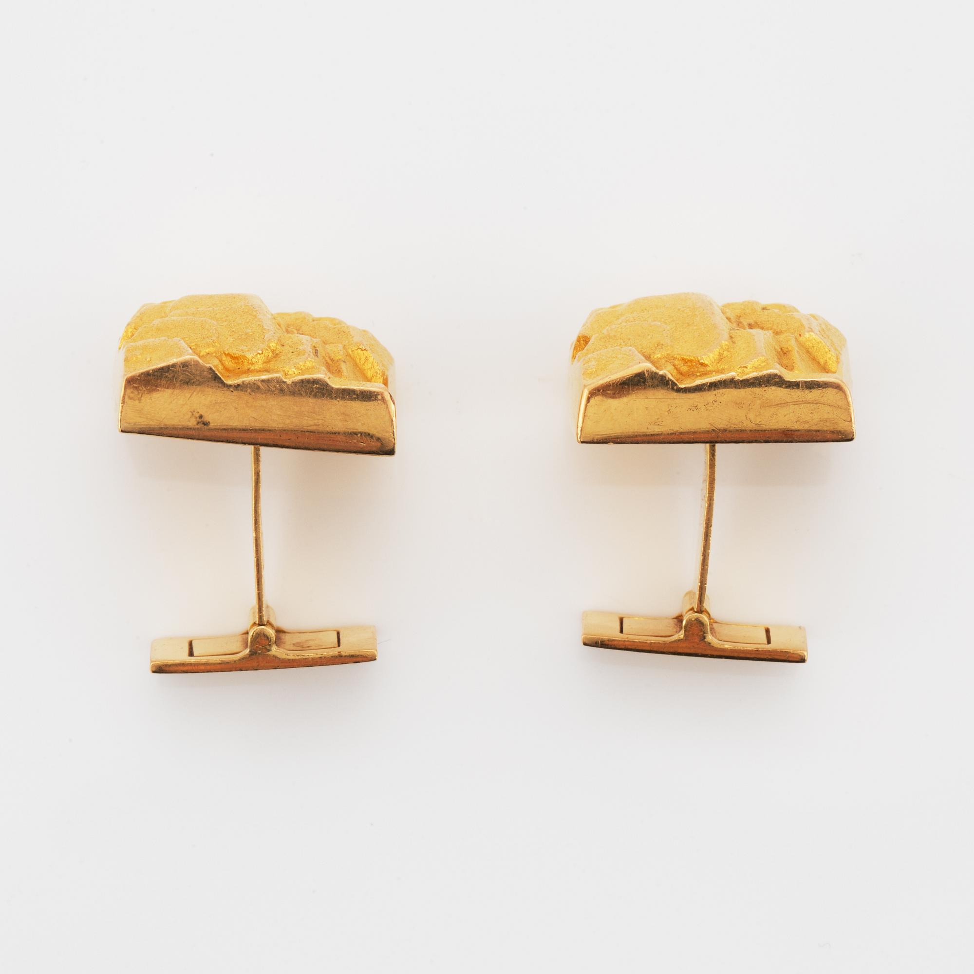 A pair of Björn Weckström 18K gold cufflinks.