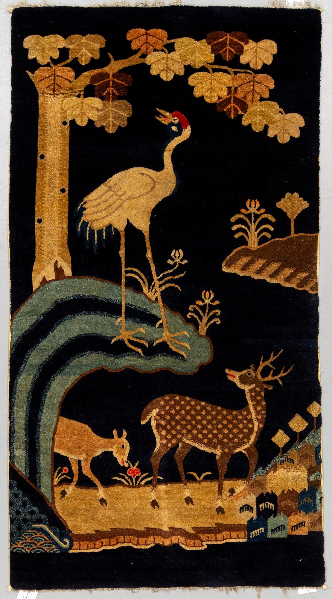 A RUG, semi-antique Baotou, China, ca 165 x 87 cm.