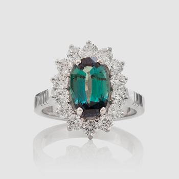 1310. A alexandrite, 2.44 cts, and diamond ring. Surrounded by 14 brilliant-cut diamonds, 1.12 cts in total.