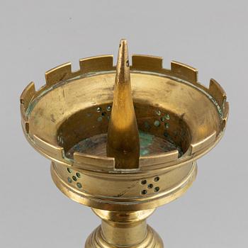 A 19th century bronze church candlestick.