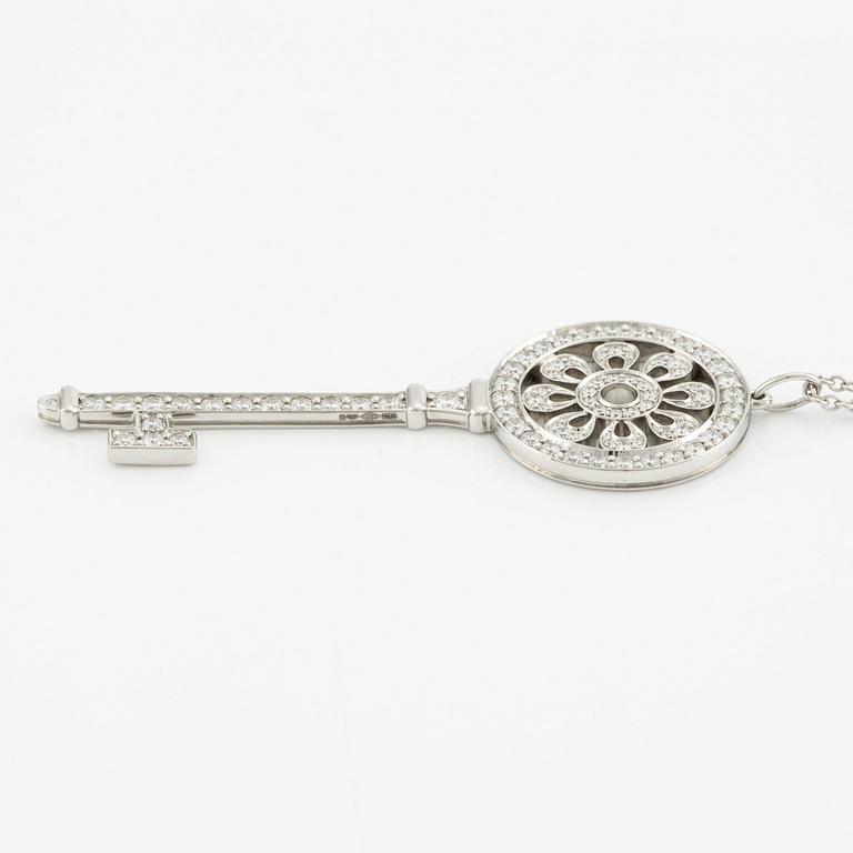 A platinum "Tiffany Keys" pendant set with round brilliant-cut diamonds.