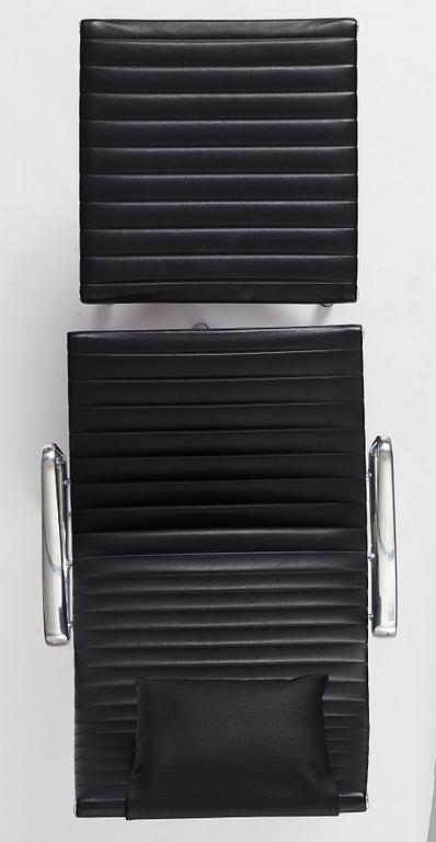 Charles & Ray Eames, an armchair and ottoman, Aluminium group model "EA 316", Vitra, 21st century.