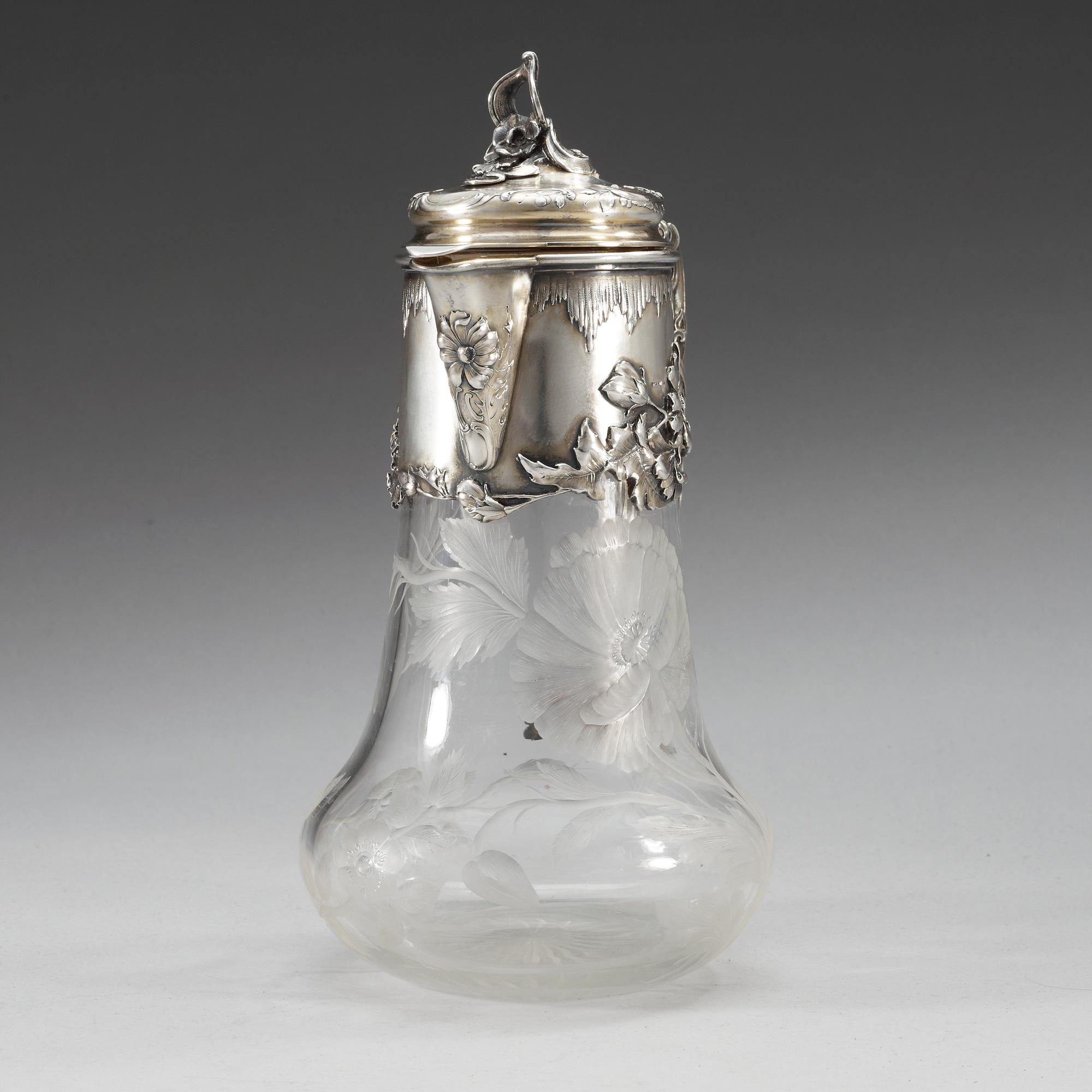 A Russian 20th century glass and parcel- gilt jug.