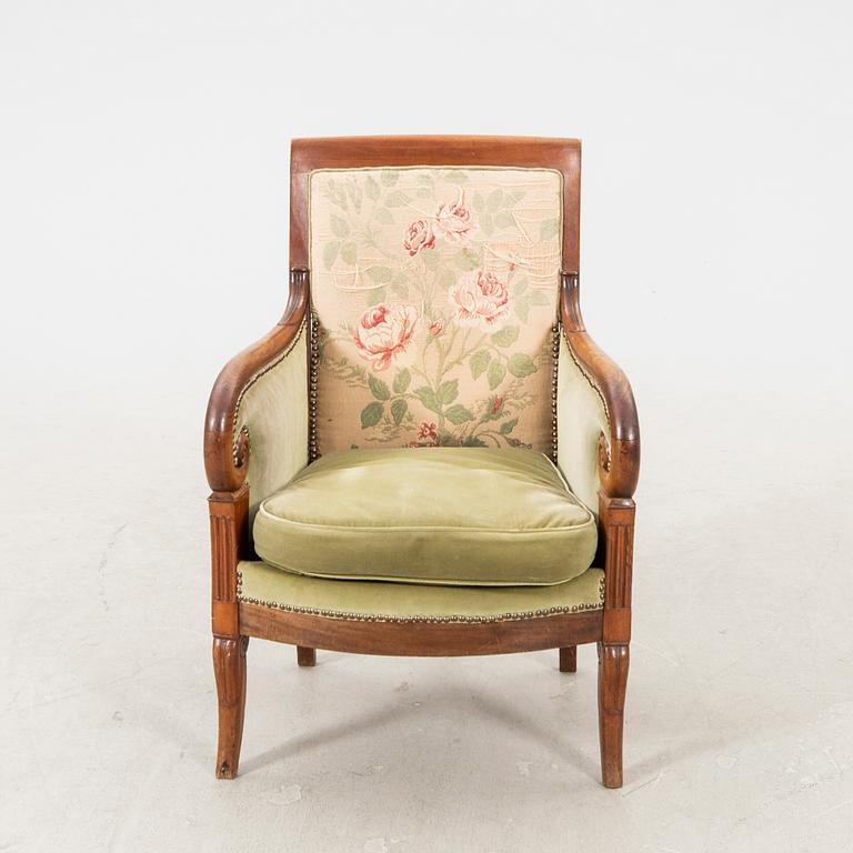 A mid 1800s mahogany bergere.