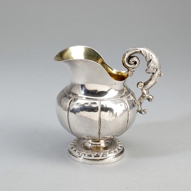 GRÄDDKANNA, silver, Johan Olof Östlund, Gällivare, 1850. Vikt ca 99g.