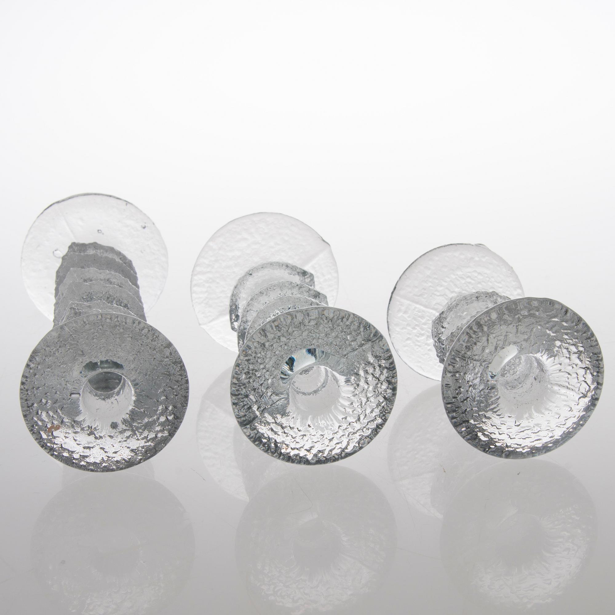 TIMO SARPANEVA, SEVEN FESTIVO GLASS CANDLESTICKS, Iittala, partly signed TS.