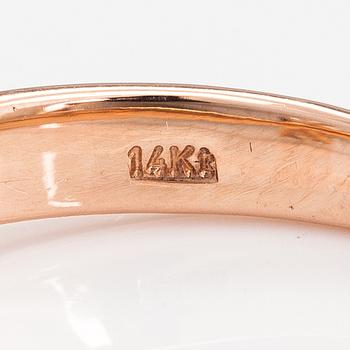 A 14K rose gold ring with a ca. 0.87 ct light brown diamond.