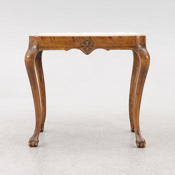 Josef Ekberg, a Rococo style tea table, Gustavsberg, first half of the 20th Century.