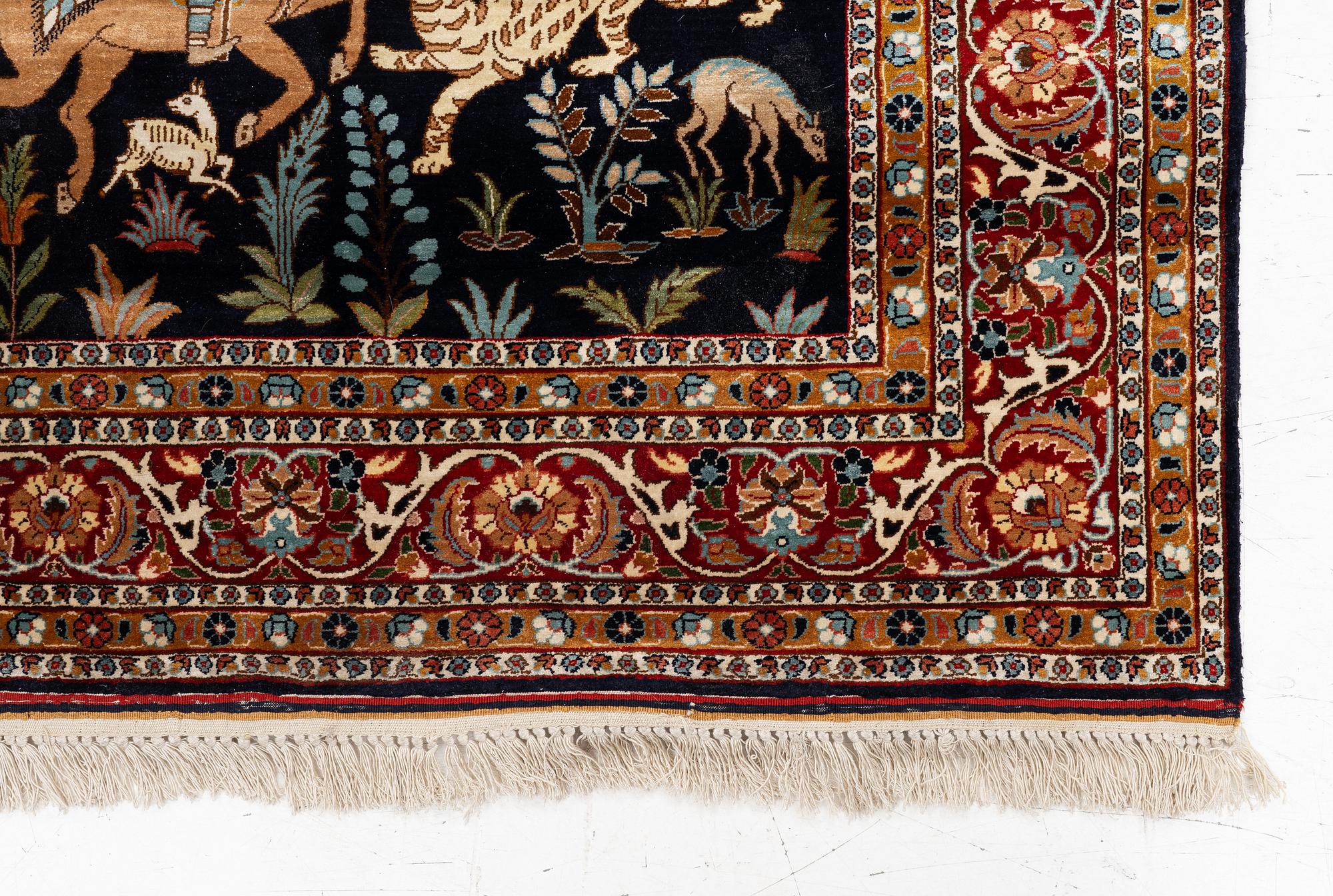 A Kashmir silk rug, c. 168 × 102 cm.