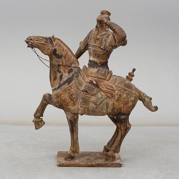 A large modern Chinese wooden sculpture.