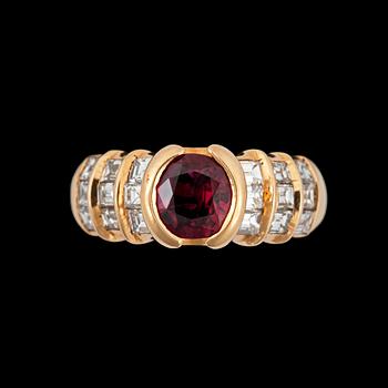 1138. A 1.54 cts ruby and diamond ring. Diamond total carat weight circa 1.44 cts.