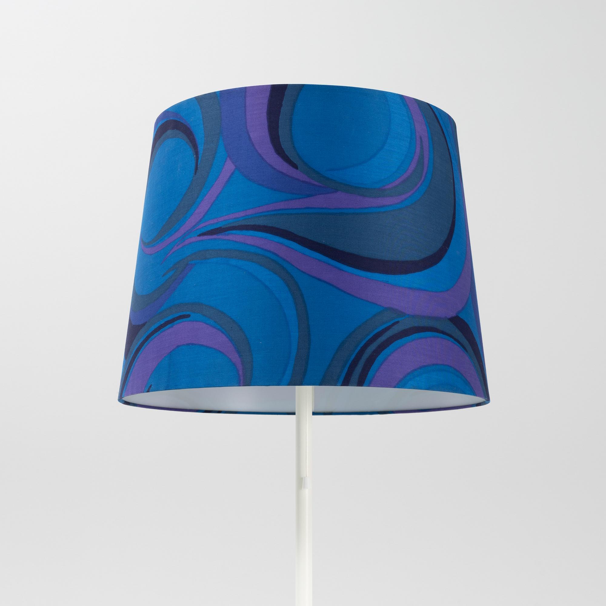 A white metal floor light, Luxus, Vittsjö.