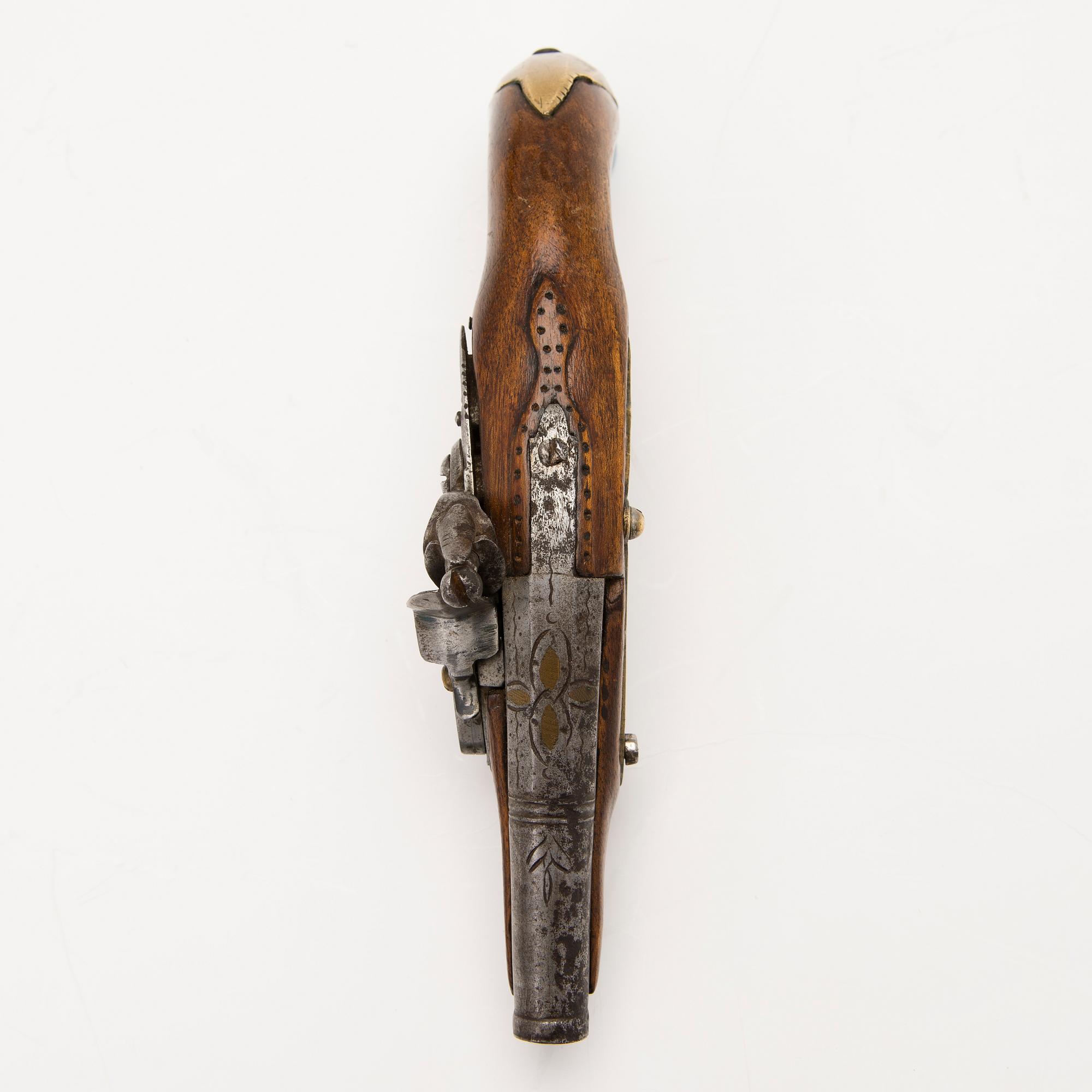 An early 19th Century flintlock pocket pistol.
