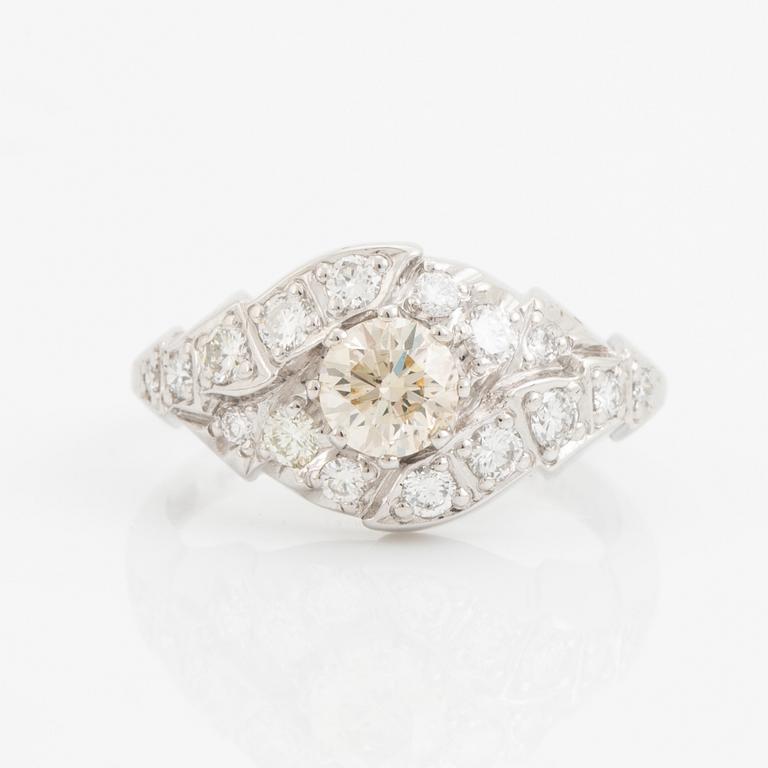 Brilliant-cut light brown diamond ring.