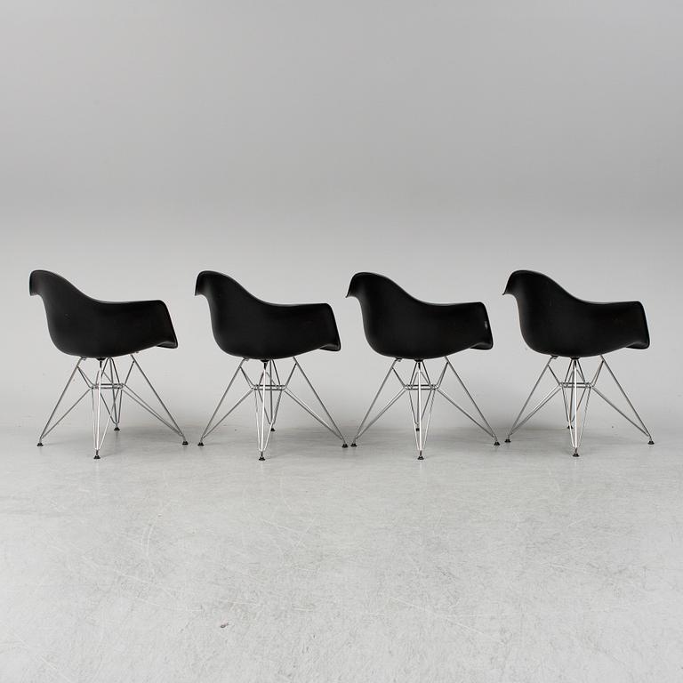 CHARLES AND RAY EAMES,  4  Eames Plastic Armchair, Vitra 2010.