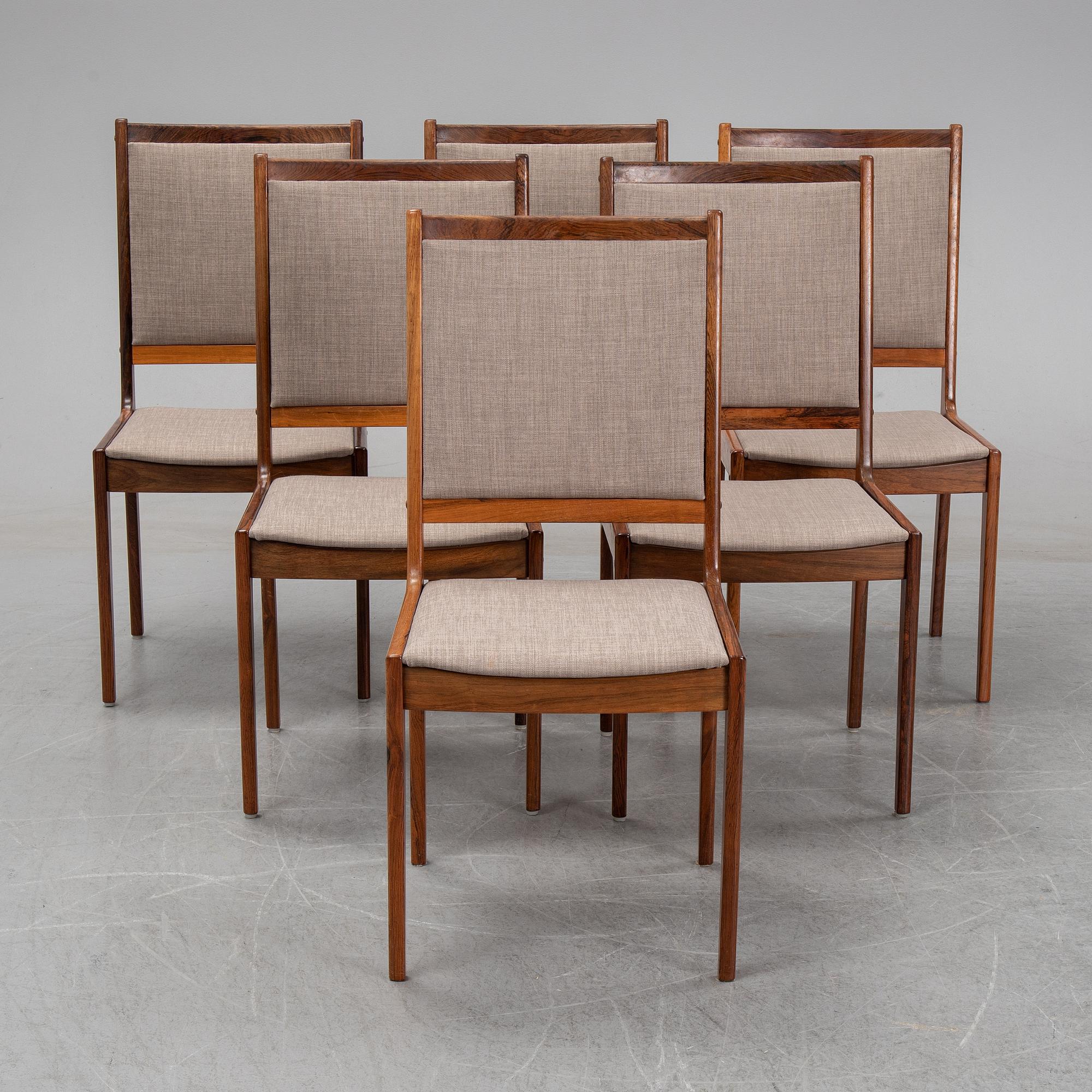 A seven-piece rosewood dining suite, 1960's/70's.