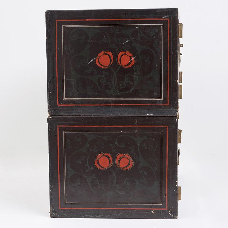 A lacquered cabinet, in two sections, Qing dynasty, 19th Century.