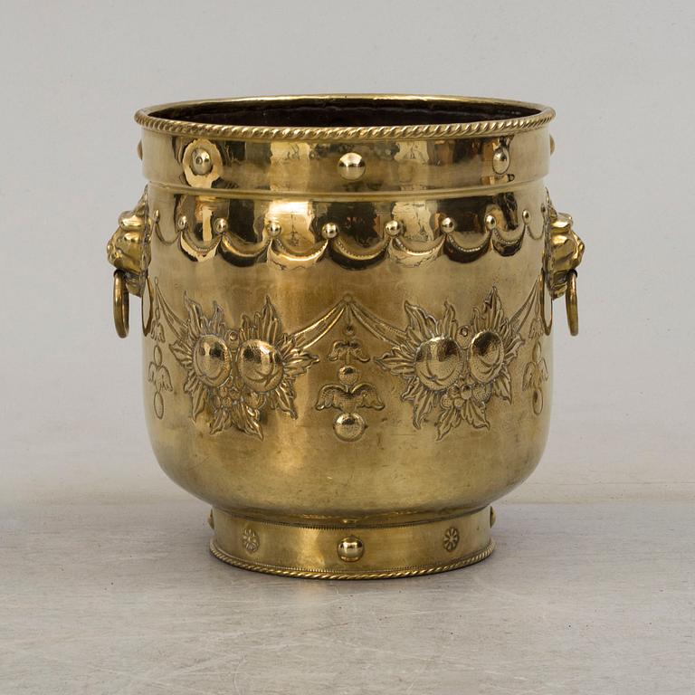 An 18th century brass flower pot.