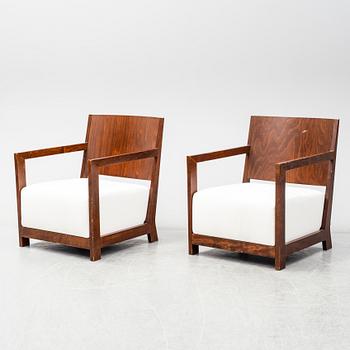 A pair of second half of the 20th century easy chairs.