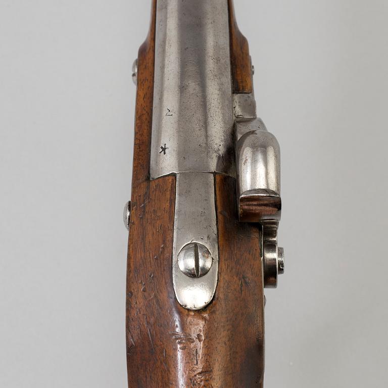 A first half of the 19th century percussion lock pistol.