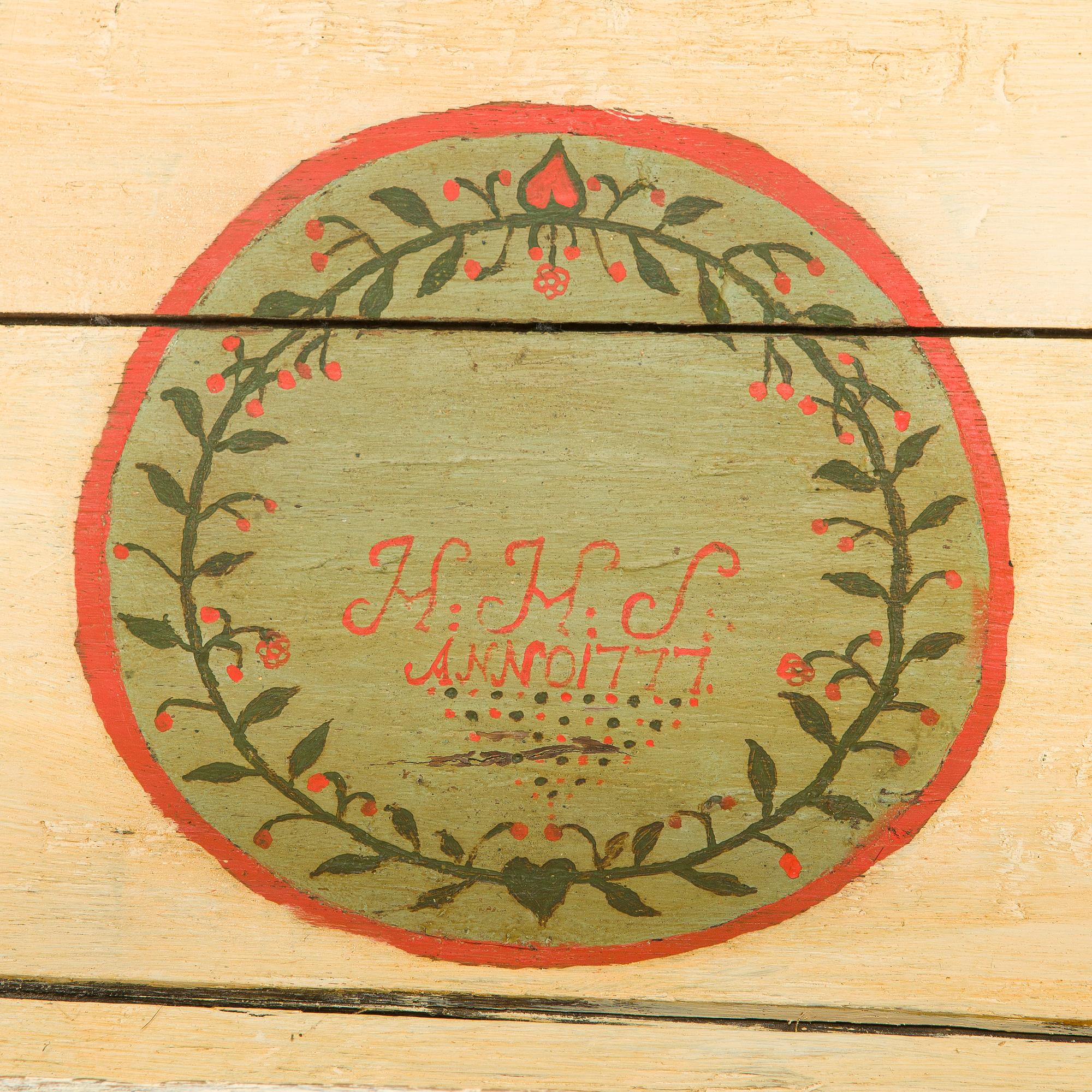 A wooden storage chest dated year 1777.