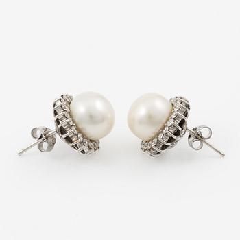 Earrings, a pair, 18K white gold with cultured pearls and brilliant-cut diamonds.