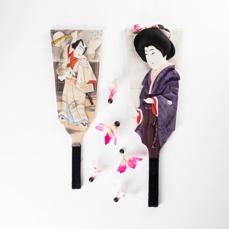 A set of two Japanese hagoita wooden paddles and five shuttlecocks, first part of 20th century.