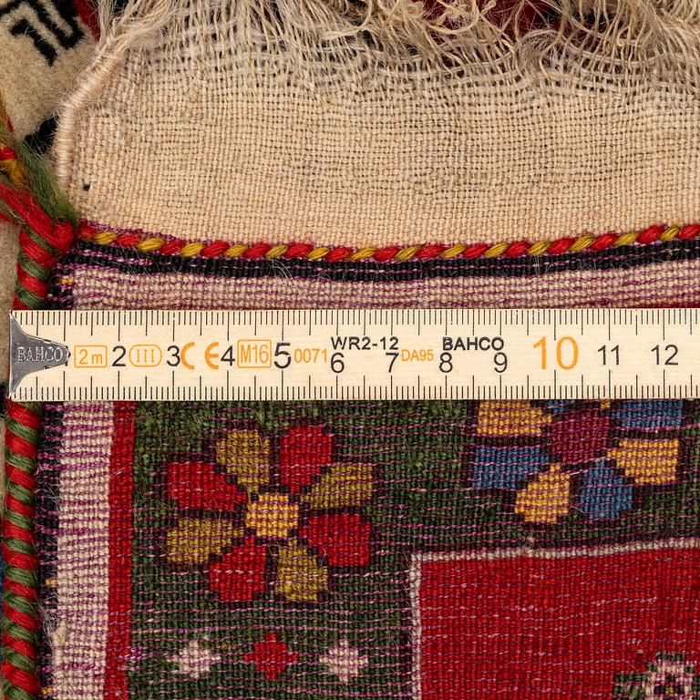 A pictoral Qashqai rug, Southwest Persia, c. 222 x 152 cm.