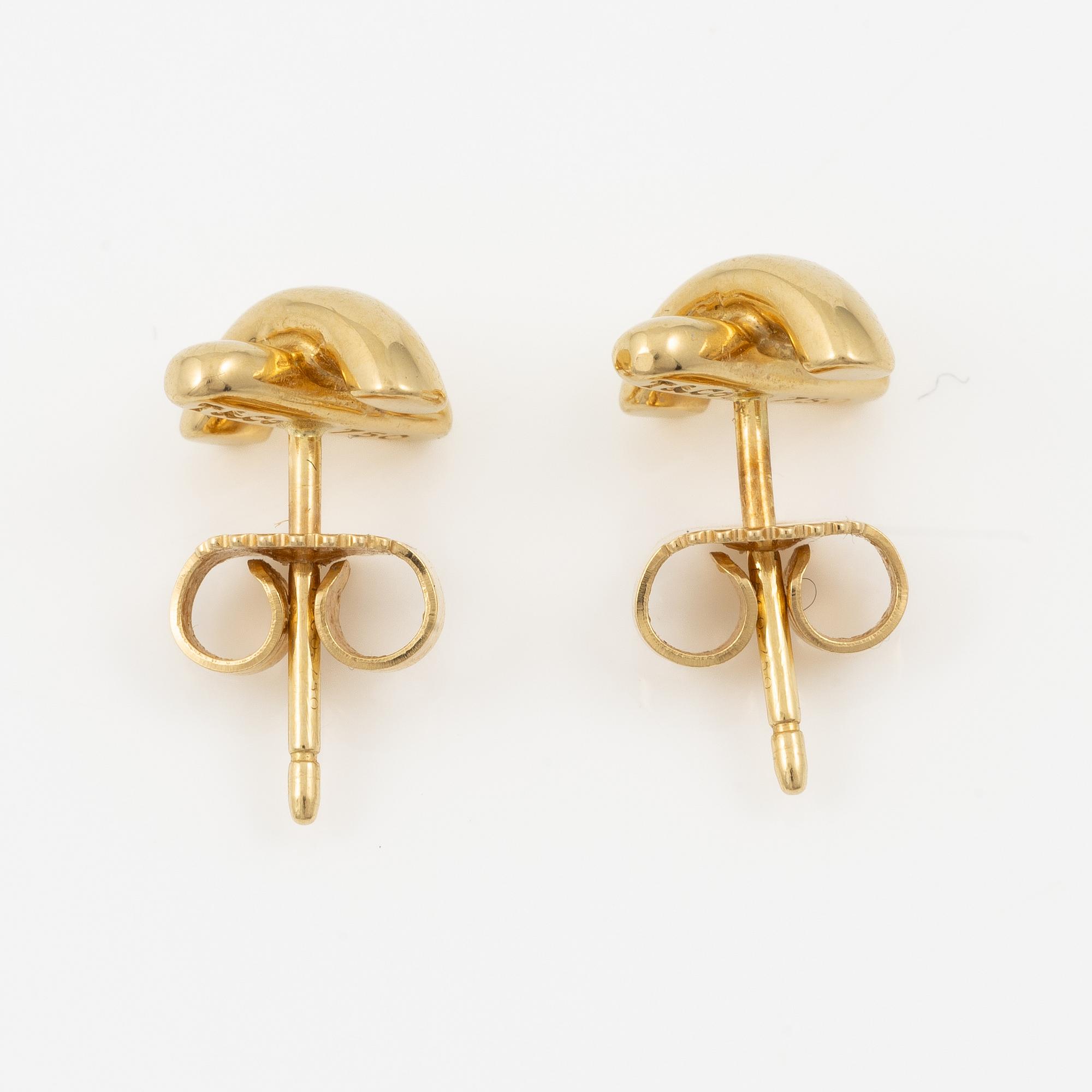 Tiffany & Co a pair of earrings 18K gold "Cross Stitch".