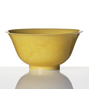 A yellow glazed 'prunus' bowl, Qing dynasty, 18th century.