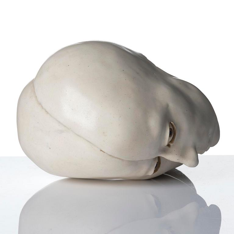 Britt-Ingrid "BIP" Persson, a glazed stoneware sculpture of faces, ca. 1970.