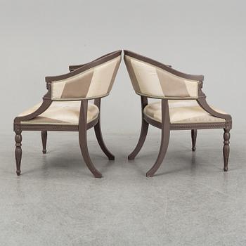 A pair of contemporary chairs in Neo classical style.