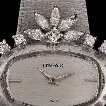 A Tiffany & co ladies wristwatch. Circa 1960- 70. Bezel set with brilliant- and navette-cut diamonds.