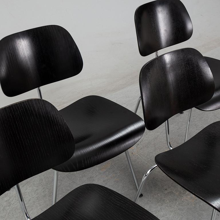 Four 'DCM' Plywood Group chairs by Charles and Ray Eames for Vitra.