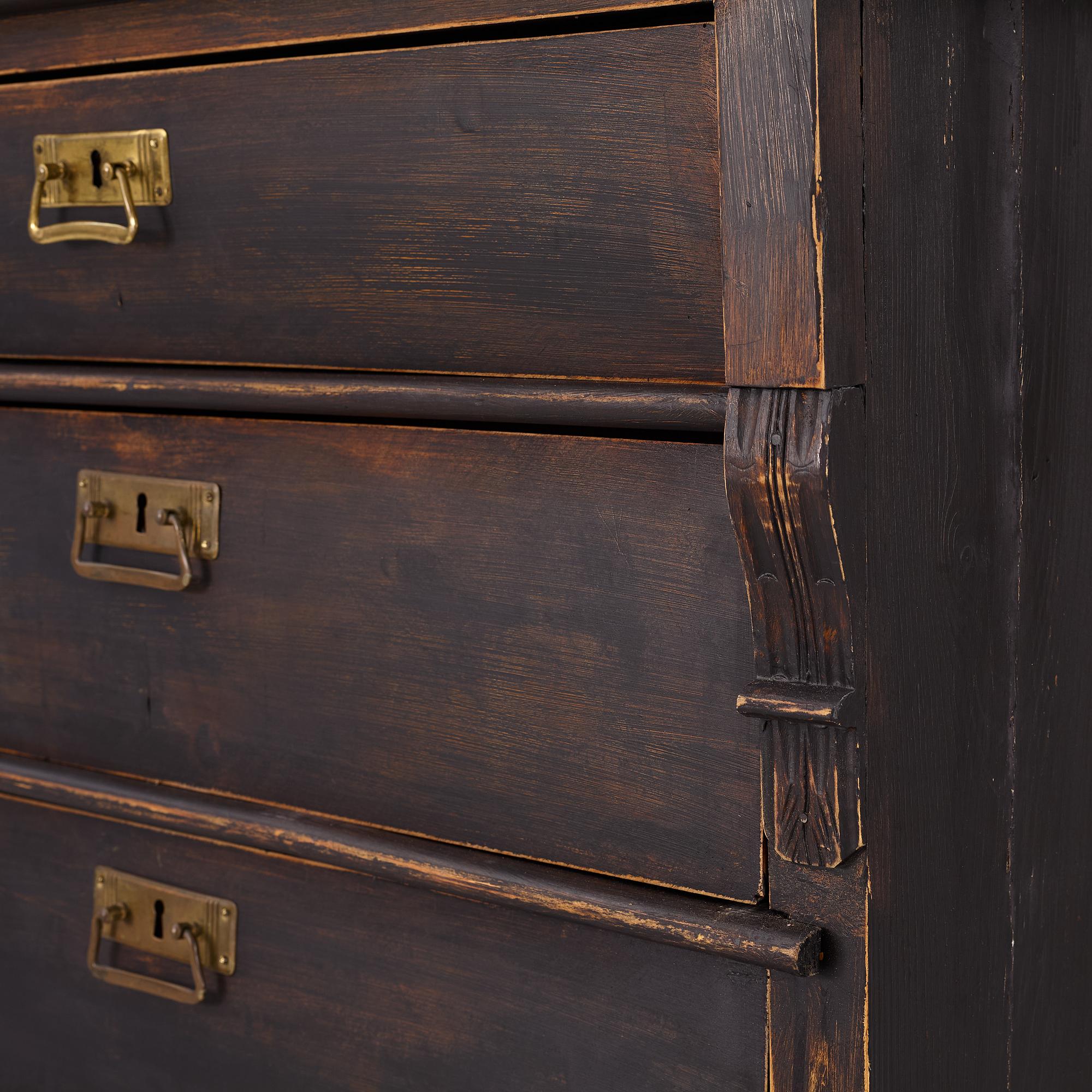 A chest of drawers, circa 1900.