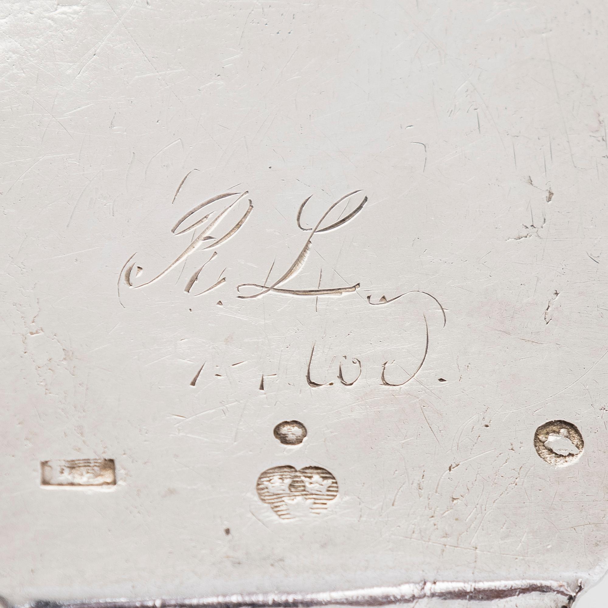 Cream jug, cake server, and sugar tongs in silver, Finland from latter part of the 18th century to 1854.