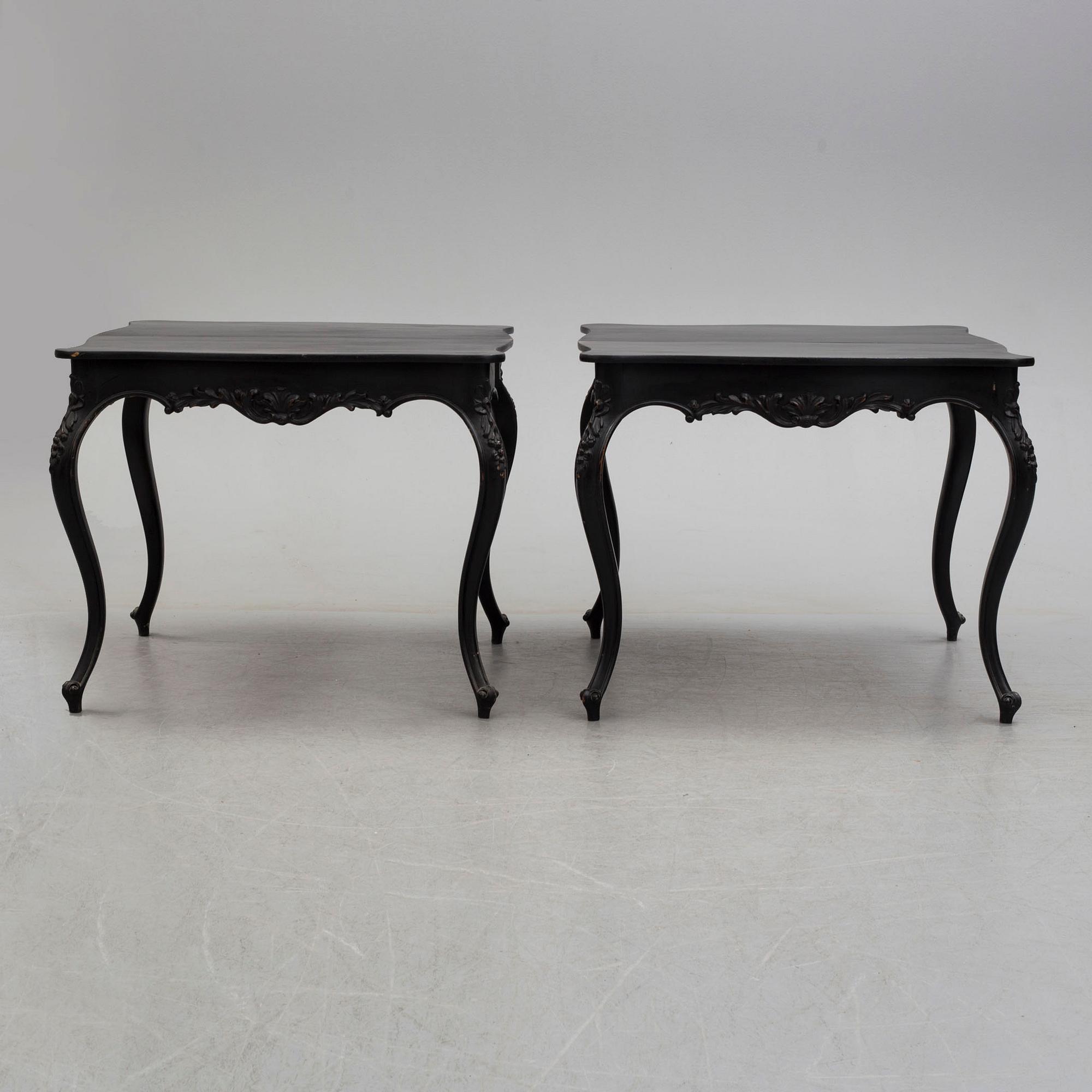 A pair of end of the 19th century new rococo style painted card tables.