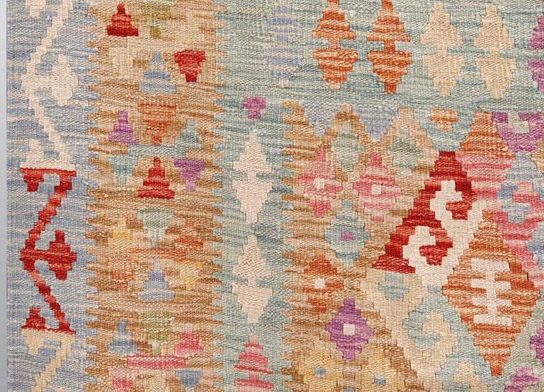 A Kilim carpet, ca 241 x 177 cm.