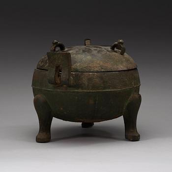 A bronze ding tripod censer with cover, presumably Han dynasty (206 BC - 220 AD).