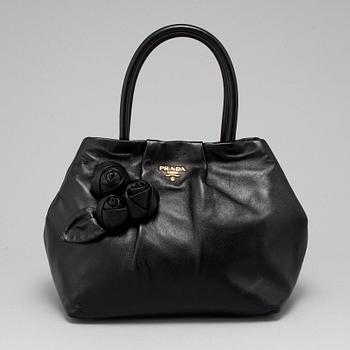 PRADA, black leather bag.