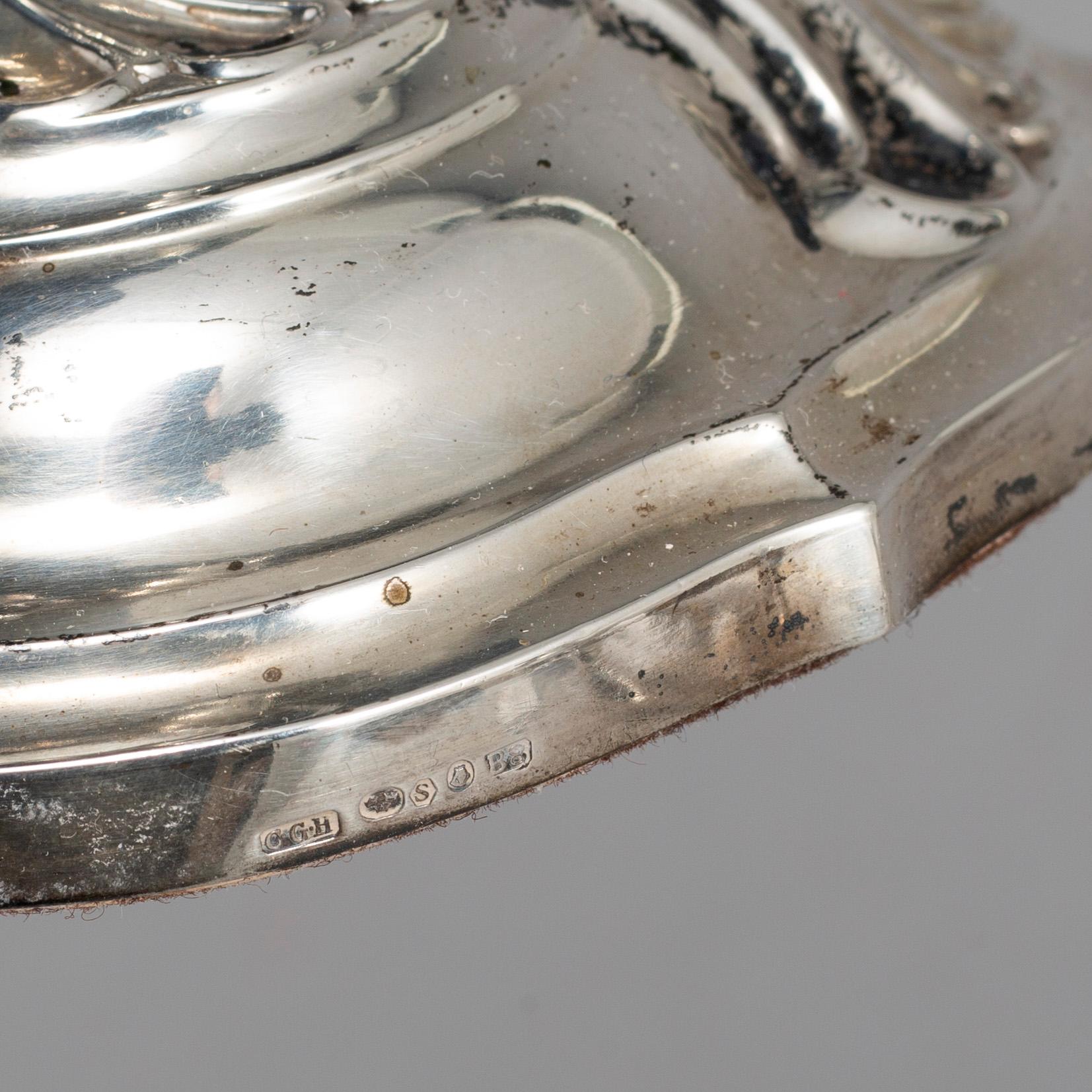 A rococo style silver candelabra, marked CG Hallberg, Stockholm 1928.