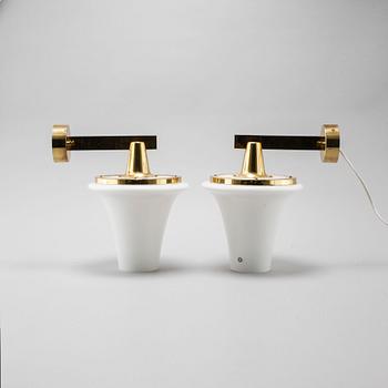 A pair of wall lamps designed by Hans-Agne Jakobsson, Markaryd, from the fourth quarter of the 20th century.